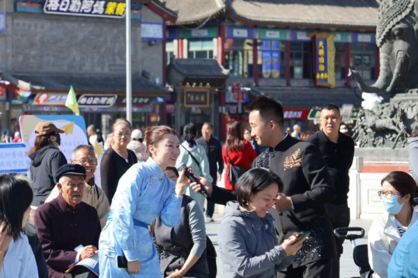 闯关集章、乌兰牧骑演出……2026国家网络安全宣传周呼和浩特现场宣传活动走进塞上老街旅游休闲街区